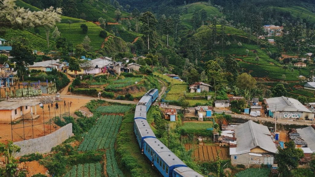 Decorative: A train moving through a village in Sri Lanka