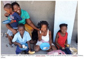 MSLI Co-founder and Program Supervisor, Talvina Valane, with a group of students having lunch at Candiza Primary School