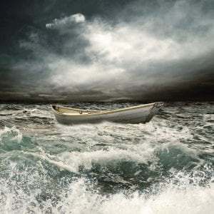 an image of a small boat in the ocean