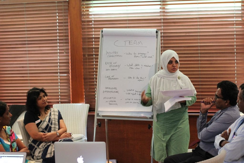 A Sri Lanka participant presenting to group
