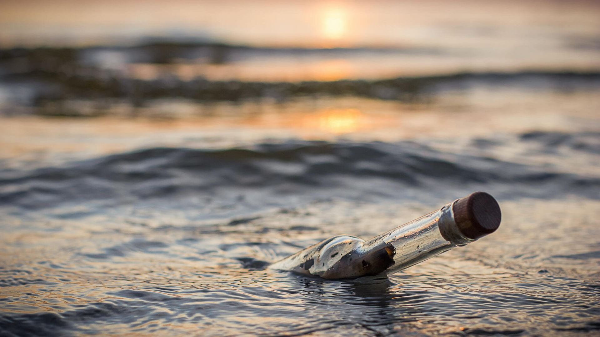 Message in a bottle in the water