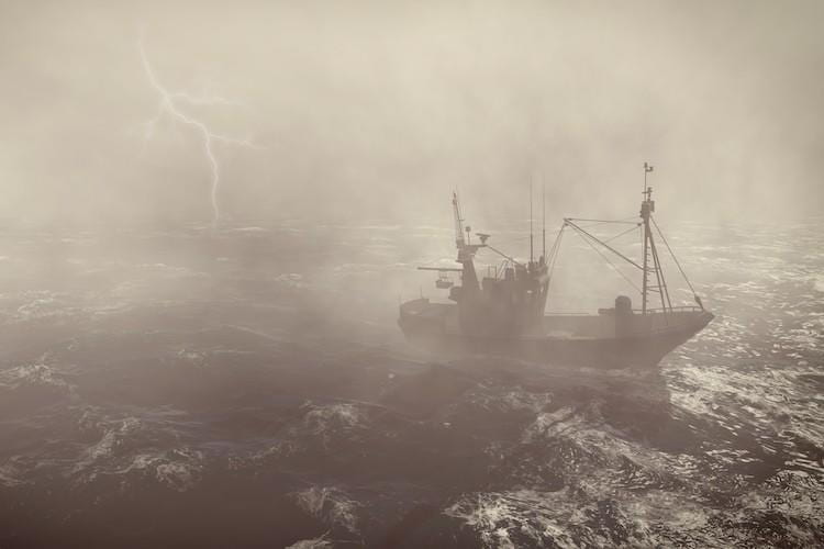 A fishing boat in stormy seas