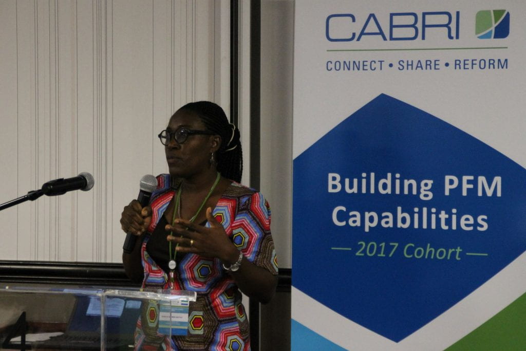 Sierra Leone participant presenting with CABRI signage behind her