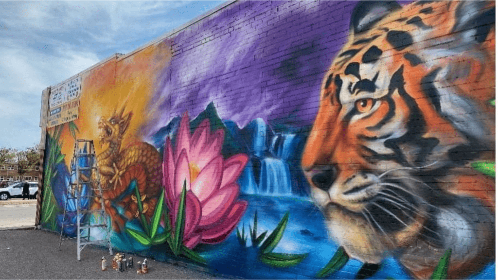 Outdoor mural of a dragon and tiger