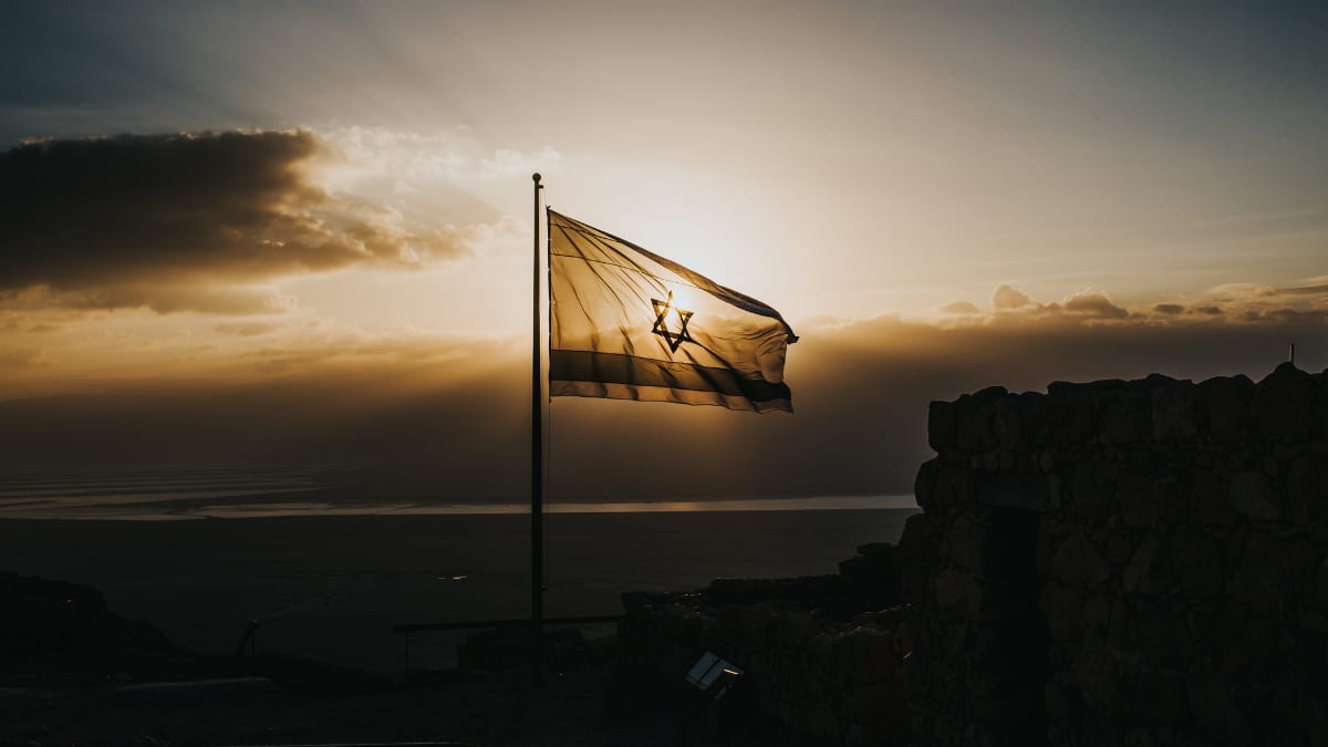 Flag of Israel at sunset