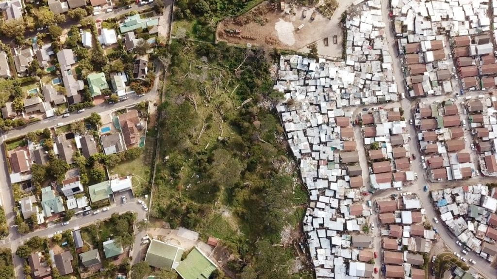 Aerial image of income disparity in South African neighborhoods