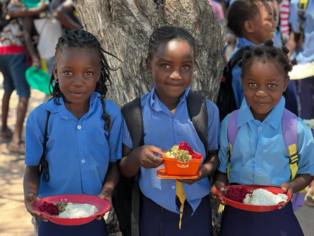 School children with lunches in Mozambique