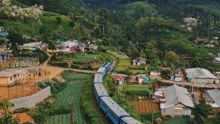 A training running through a village in Sri Lanka