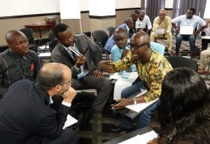 Alieu working in a group