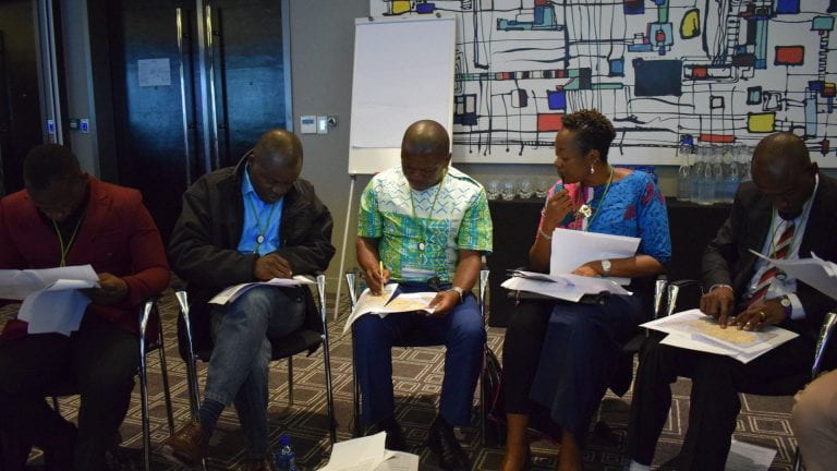 Participants doing an group exercise