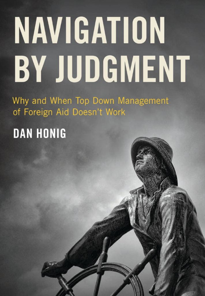 Navigating by Judgment book cover - sailor steering