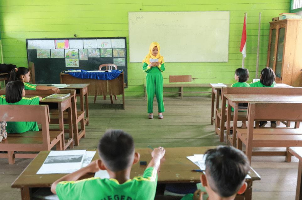 young girl in class