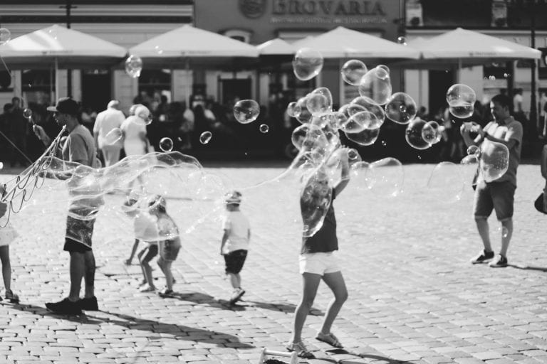 Children playing with bubbles