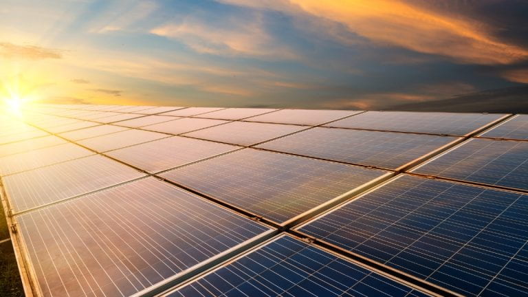 Solar panels at sunset
