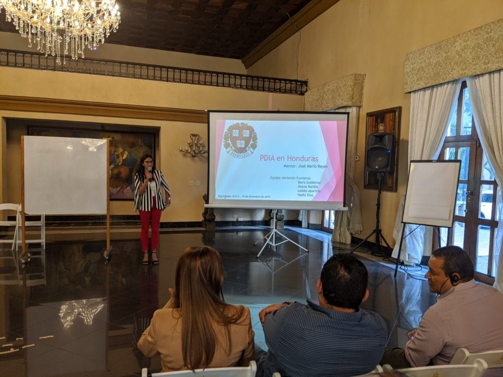 Participant presenting with slides to the side