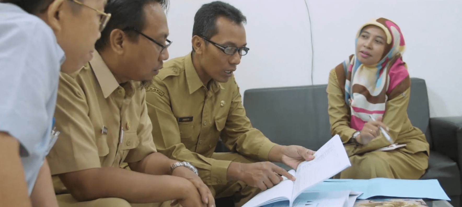 Group working together in Malaysia