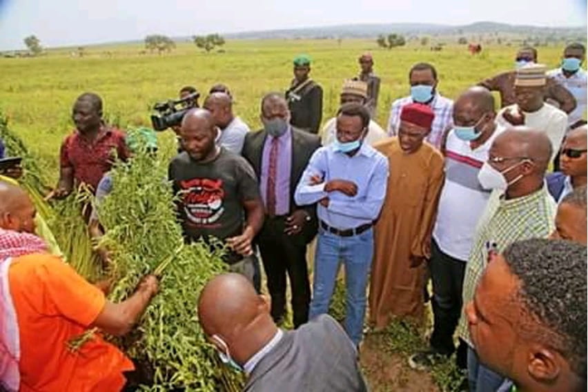 A crowd including cameraman surrounding the executive governor of Nasarawa State