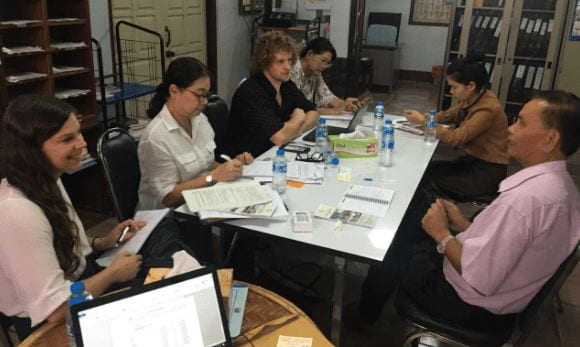 a group meeting around a table