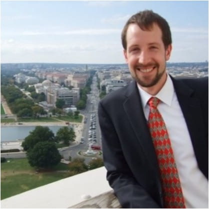 Headshot of Adam Harrison in D.C.