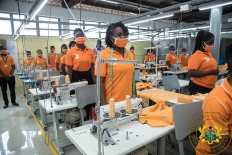 Ghana youth working in sewing factory