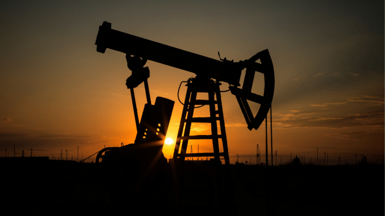 Oil rig at sunset