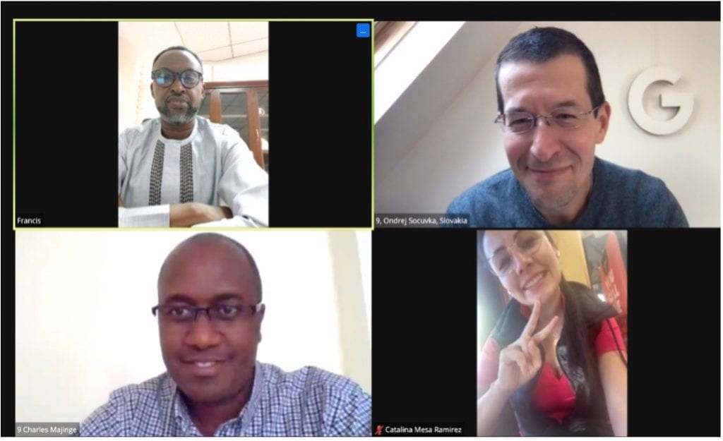 screen capture of team on zoom call.
