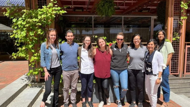 BSC group photo outside in front of a restaurant