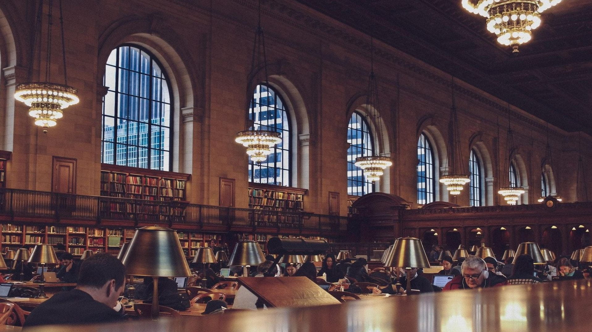 A library with people working