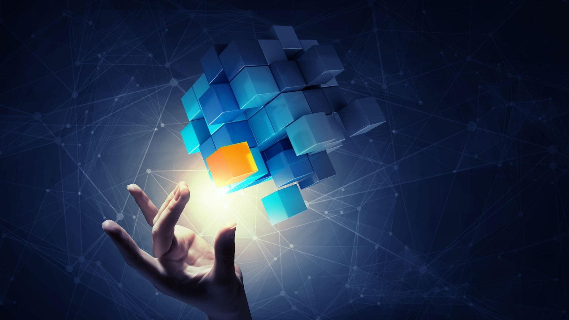 A 3 dimensional puzzle of squares with one square highlighted and a hand reaching for it