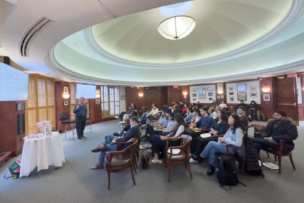 Steve Kadish presenting in front of seated students