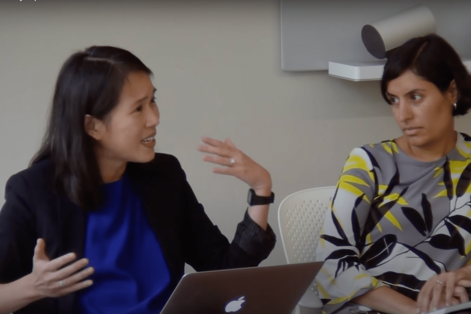 Salimah Samji listens as Lily Tsai presents