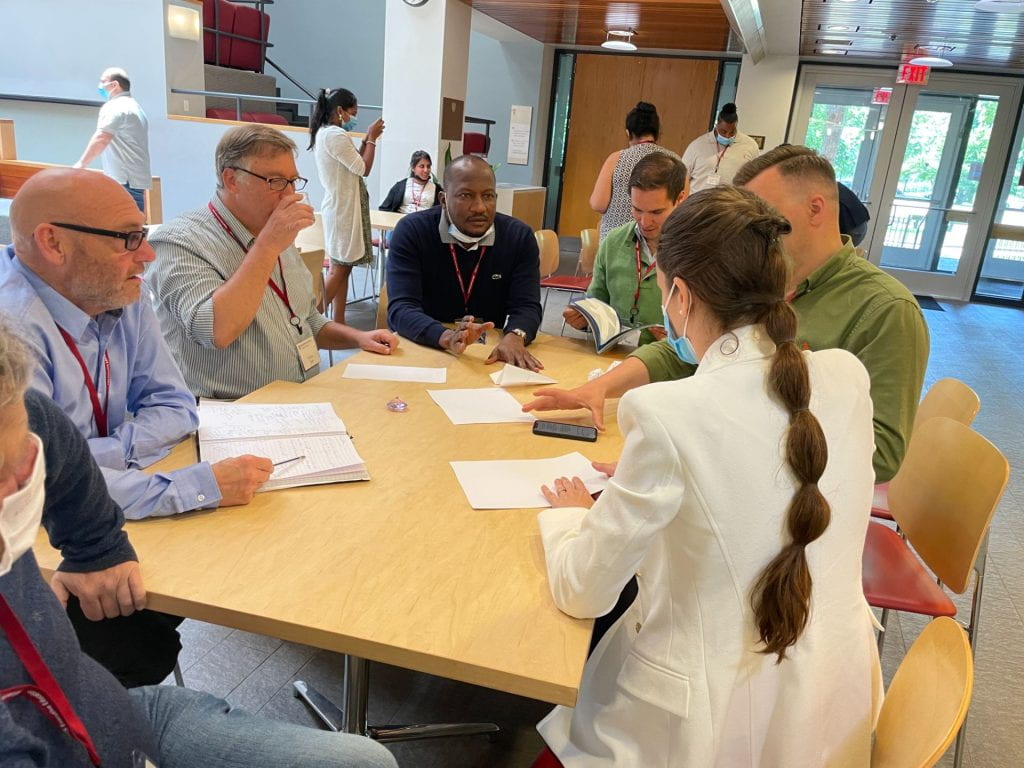 Participants collaborating and in discussion