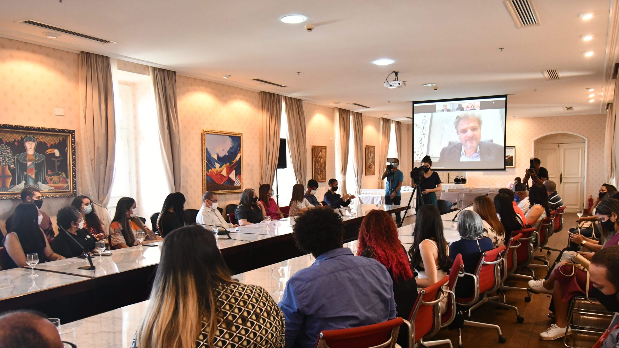 Matt Andrews joining a session in Brazil virtually