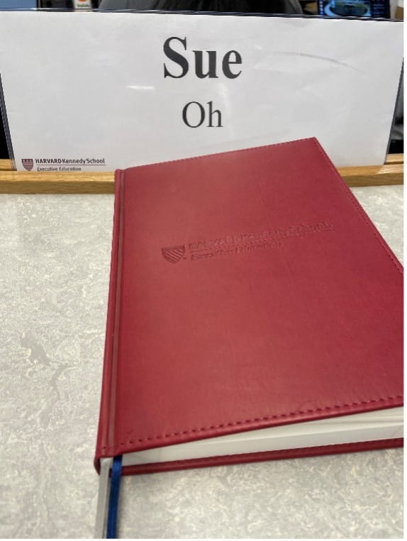 Picture of name placard and notebook.