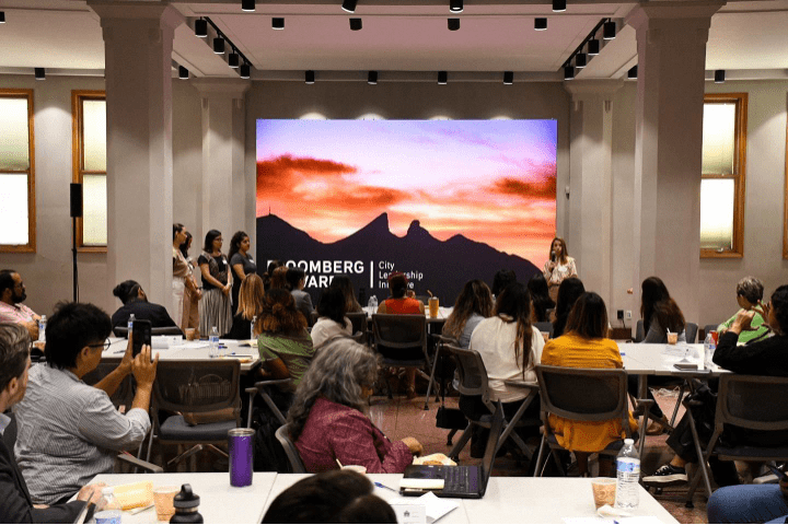 Monterrey team presenting to a crowd