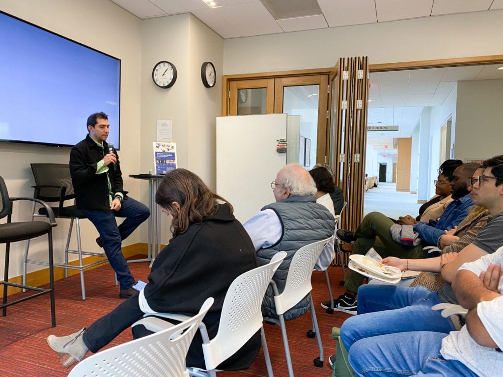 Daniel Barjum presenting to audience members