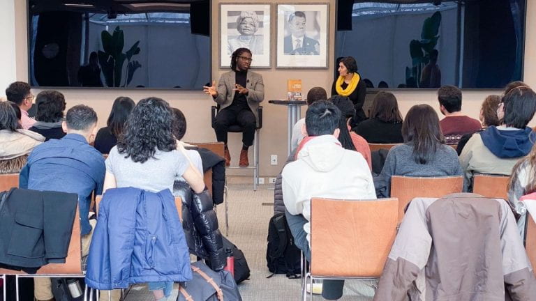 Daniel Agbiboa and Salimah Samji presenting to audience