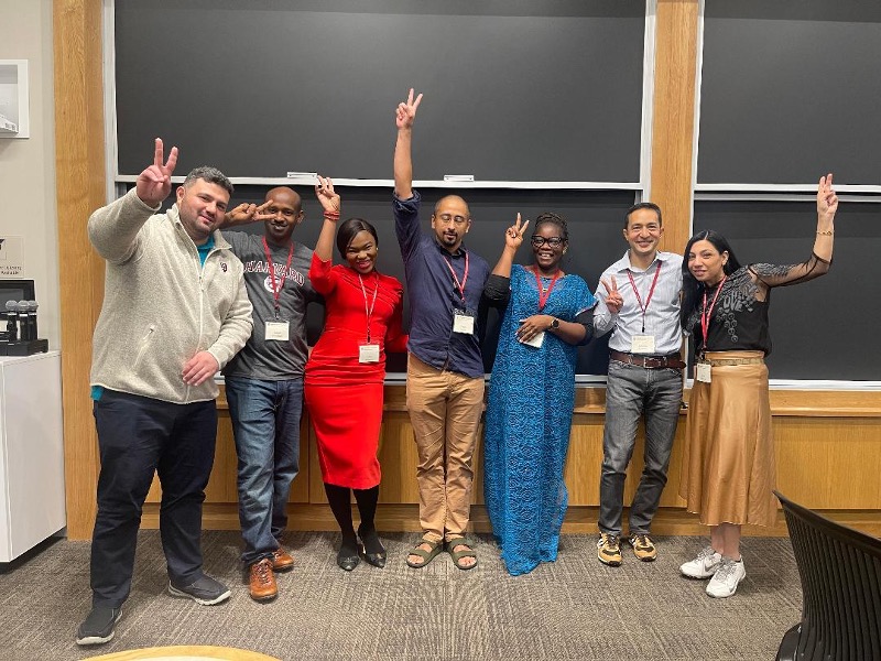 Esther with fellow IPP alumni in classroom