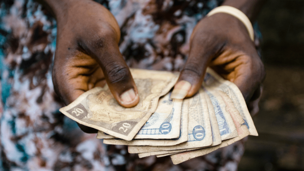Hands holding cash