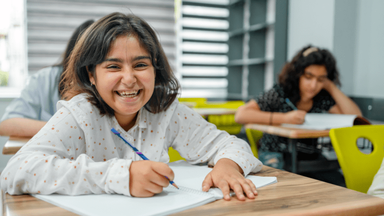 Children in school smiling