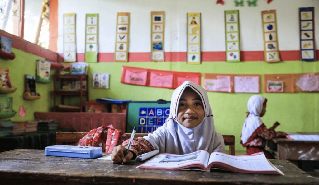 a young girl in a classroom
