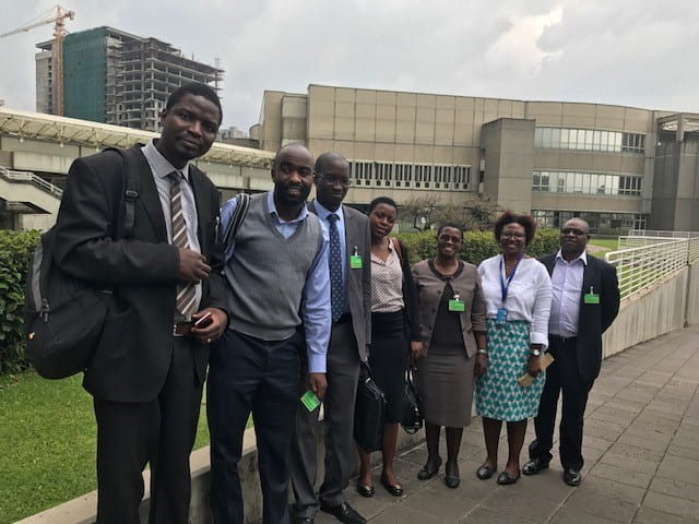 group photograph in front of a building