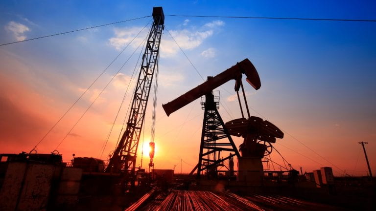 Oil field at sunset