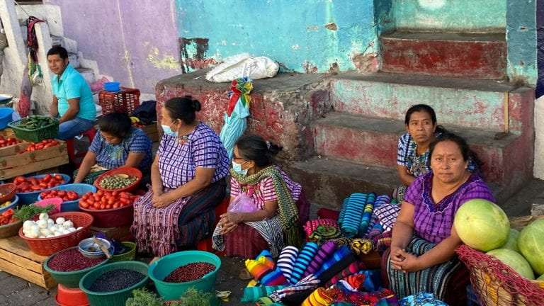 People working in a market in Guatemala