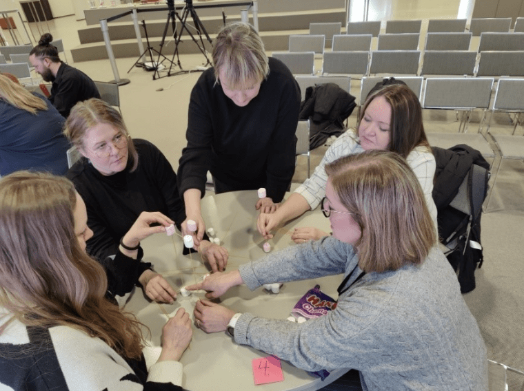 A team of 5 people working together