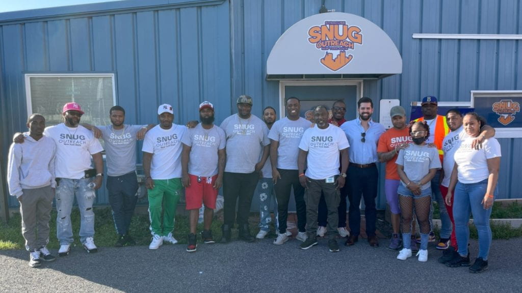 Pablo with SNUGG staff in Syracuse