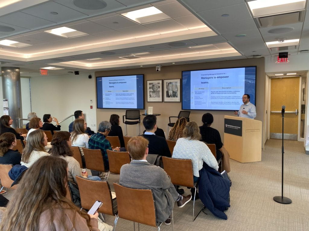 Dan Honig presenting to audience members