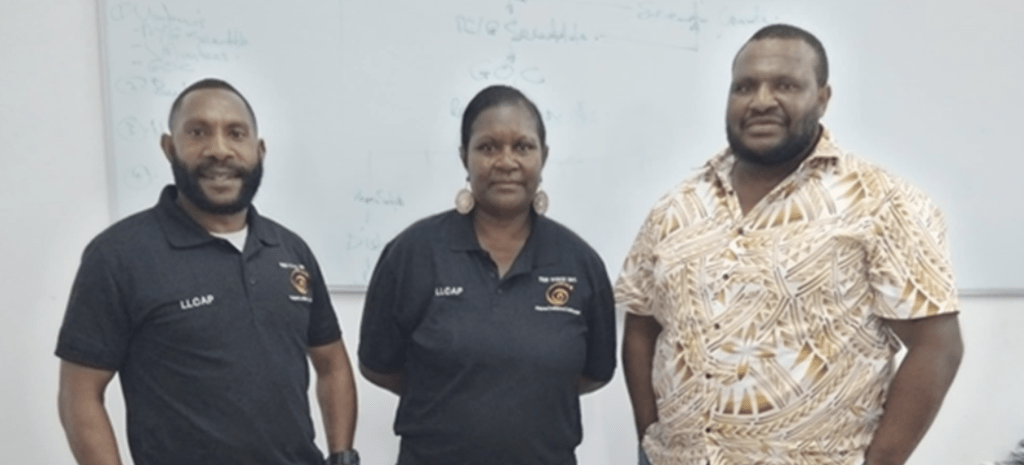 Evenezer from Department of Religion & Community Development standing with participants