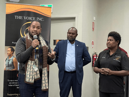 A man gives a speech at The Voice Inc.