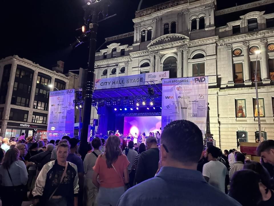 People at an outdoor city hall concert